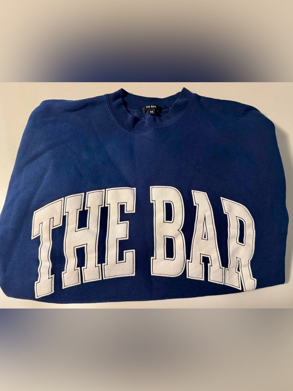 The Bar Navy Sweatshirt with White Varsity Lettering